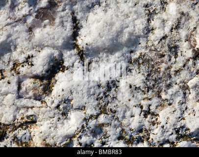 Surface of a rough rock from quartz and other minerals Stock Photo