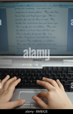 Hands typing on  a laptop. Stock Photo