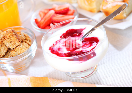 Healthy breakfast or snack with yogurt, pound cake and fresh fruits ...