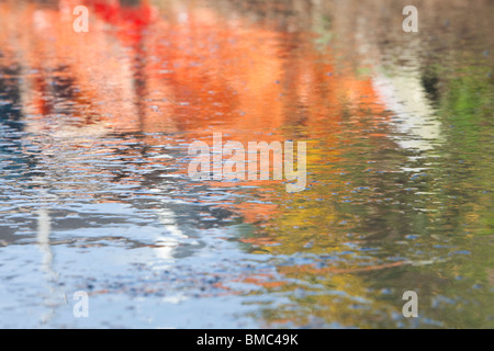 Reflections in wet concrete poured into a house extension for the flooring. Stock Photo