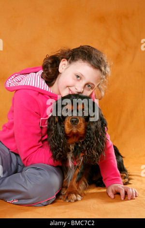 Mädchen mit Cavalier / girl with King Charles Spaniel Stock Photo