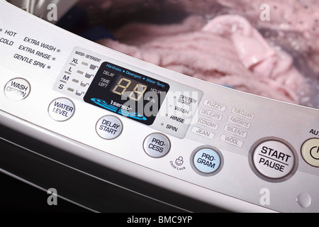 Control panel of a top-loading washing machine. Stock Photo