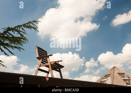 A large chair on the roof of Hayes Garden World in Ambleside, Lake District, UK. Stock Photo