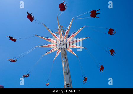 Visitors take advantage of the rides in Luna Park in Coney Island in the Brooklyn borough of New York on Memorial Day weekend Stock Photo
