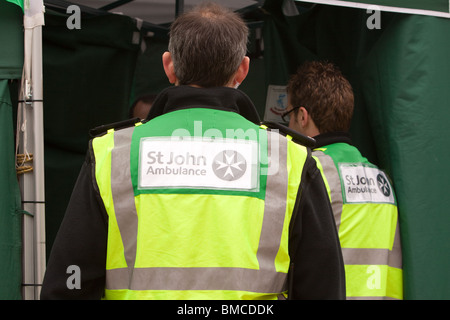 St John personnel talking whilst on duty Stock Photo