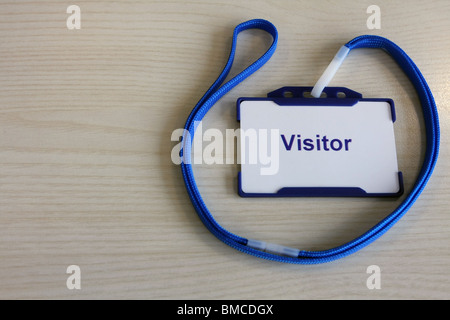 a visitors badge in a holder Stock Photo