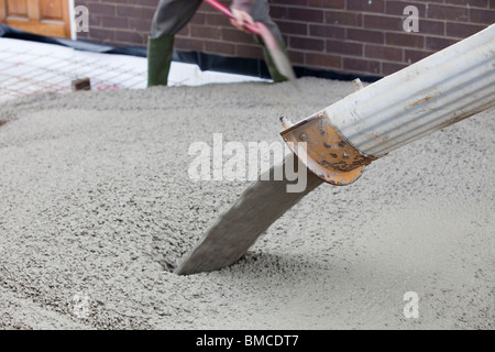 Pouring concrete for the floor of a house extension, Ambleside, UK. Stock Photo