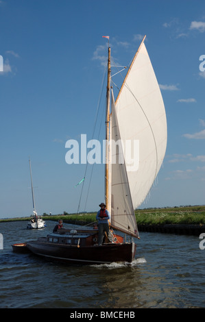 Heritage Broads yacht Lustre (1932) on the River Bure, Norfolk, Broads National Park Stock Photo