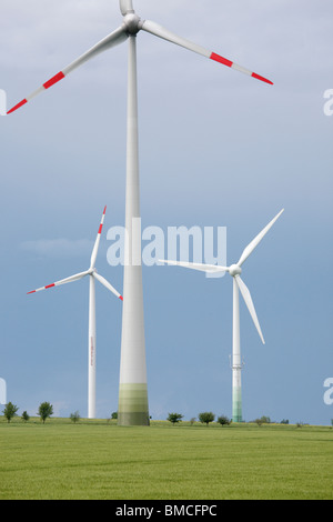 wind turbines on farmland in spring Stock Photo