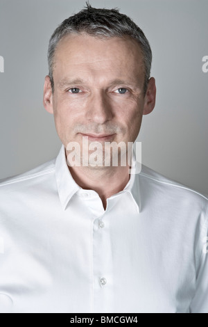 Portrait of Man wearing White Shirt Stock Photo