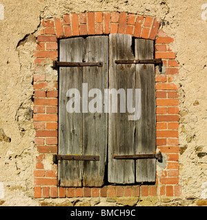 Old closed shutters. Stock Photo