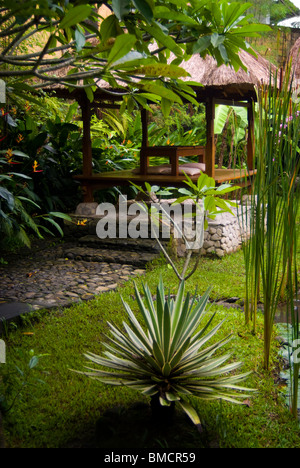 The garden entrance to the Tegal Sari Hotel in the village of Ubud on the island of Bali. A beautiful and tranquil spot. Stock Photo