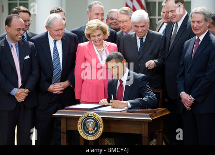 President Barack Obama Signs the Credit Card Accountability Responsibility and Disclosure act. Stock Photo