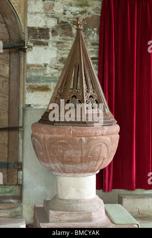 UK, England, Devon, Dittisham, St George’s church, historic Norman red sandstone Font Stock Photo