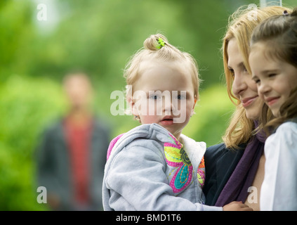 Prague, 30 May 2010 -- Wife and children of Czech singer Karel Gott attend Prague Zoo's christening of gorilla baby 'Kiburi' Stock Photo