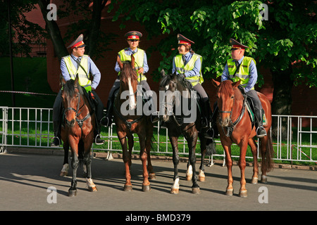 Four mounted Russian police officers outside the Kremlin in Moscow, Russia Stock Photo