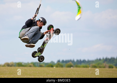 Middle Wallop Kite festival 2010, Kite landboarding and buggying on airfield on summers day Stock Photo