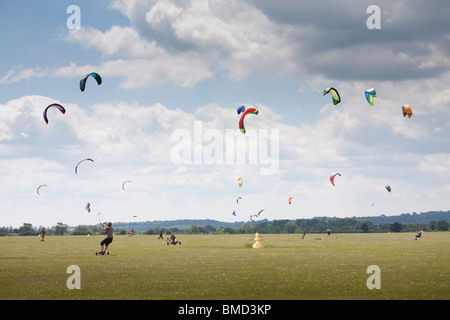 Middle Wallop Kite festival 2010, Kite landboarding and buggying on airfield on summers day Stock Photo