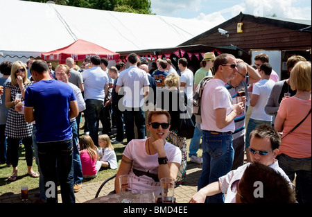 People in the garden of the Hoop Pub in Stock in Essex.  Photo by Gordon Scammell Stock Photo