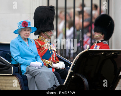 Britain's Queen Elizabeth II and Prince Philip the Duke of Edinburgh leaving Buckingham Palace for the Trooping of the Colours Stock Photo