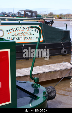 traditional english narrow and wide canal boats moored at scarisbrick marina near fettlers wharf marina liverpool leeds canal Stock Photo