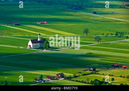 Aerial view of St Coloman pilgrimage church and the Bavarian countryside near the town of Fussen in Germany. Stock Photo