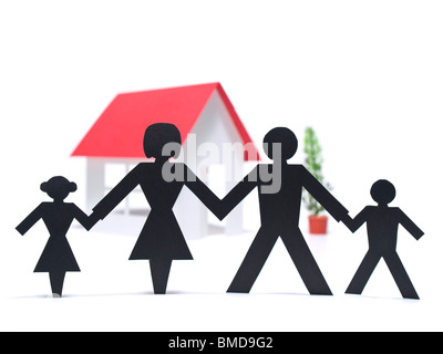Paper doll family holding hands Stock Photo - Alamy