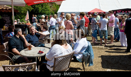 People in the garden of the Hoop Pub in Stock in Essex.  Photo by Gordon Scammell Stock Photo