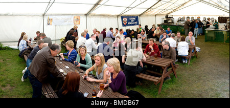 A panoramic view of the interior of the marquee at the Hoop Pub Beer Festival in Essex.  Photo by Gordon Scammell Stock Photo