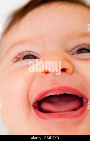 Baby girl laughing Stock Photo