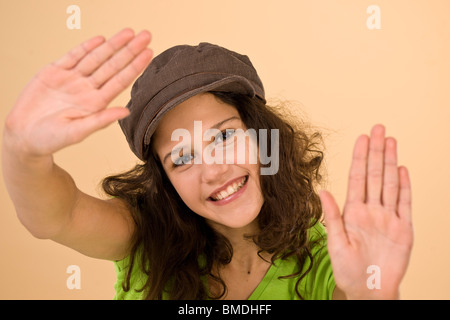 Teenage Girl Framing with Hands Stock Photo