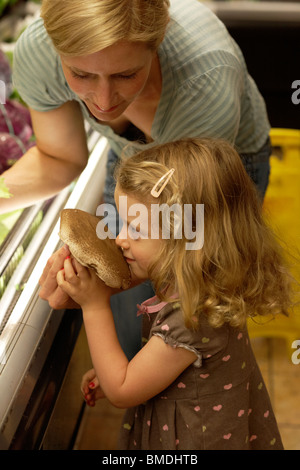 Mother and Daughter Grocery Shopping Stock Photo