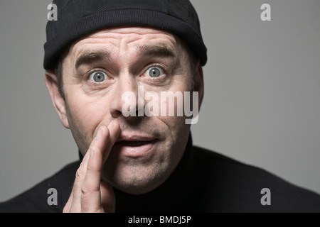 Man Telling Secret Stock Photo