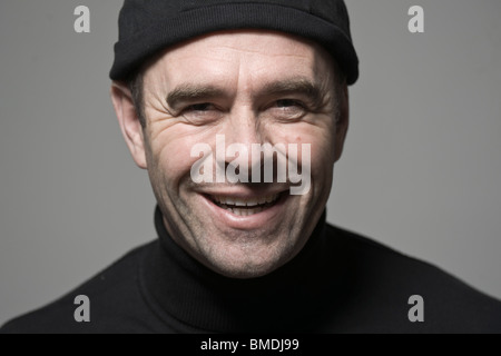 Portrait of Man in Black Cap Stock Photo