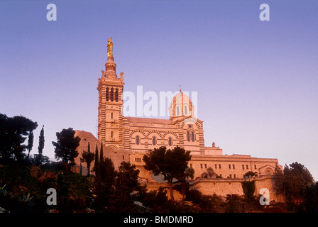 The Notre Dame de la Garde built in the 19th century is 150 meters hilltop perched Stock Photo