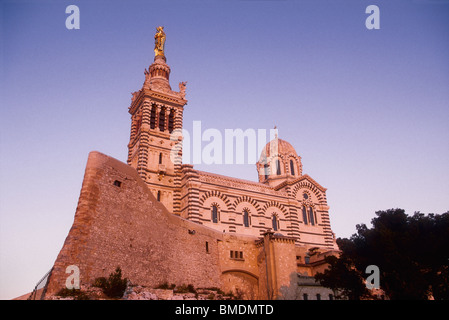 The Notre Dame de la Garde built in the 19th century is 150 meters hilltop perched Stock Photo