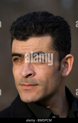 Portrait of an ethnic man looking away in Berlin Germany Stock Photo