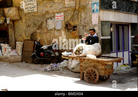 poor street merchant ,back streets of the old district,Al Gamaliya, Islamic Cairo,cairo,egypt Stock Photo