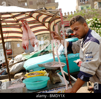 street butcher ,souk goma (friday market), street market, Southern Cemeteries, Khalifa district ,cairo Stock Photo