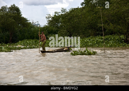 Fisherman waiting for catch, Mekong Delta, Vietnam Stock Photo - Alamy
