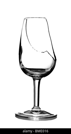 A broken sherry glass, isolated on a pure white background. Stock Photo