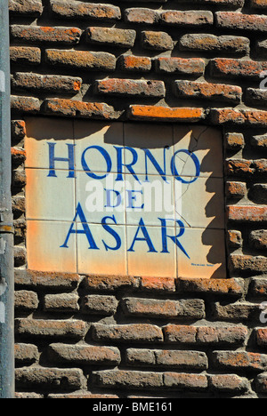 Madrid, Spain. Details of tiled sign on outside wall of Botin Restaurant (17thC, oldest restaurant in Europe) Horno de Asar Stock Photo