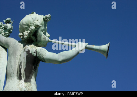 statue of boy blowing trumpet 02 Stock Photo