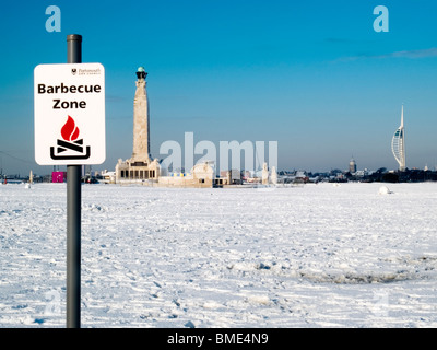 snow blankets the common by the seafront with spinnaker tower in the distance portsmouth england Stock Photo