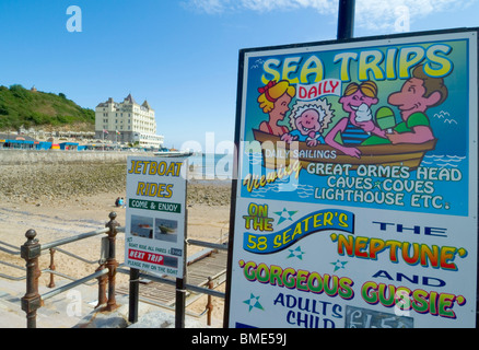 llandudno wales beach Boat trip sign Llandudno promenade Gwynedd North Wales UK GB Europe Stock Photo
