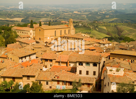 Church of Sant Agostino from the city walls of San Gimignano Val di Chianti Tuscany Italy EU Europe Stock Photo