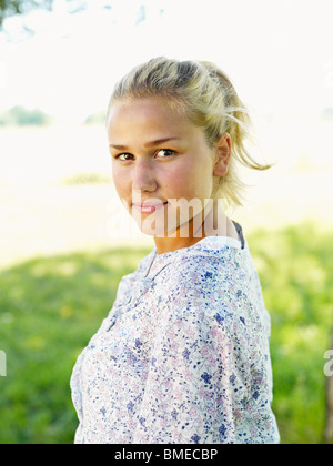 Young woman smiling, close-up, portrait Stock Photo