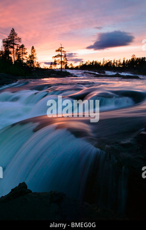 Scandinavia, Sweden, Lapland, View of waterfall at dawn Stock Photo