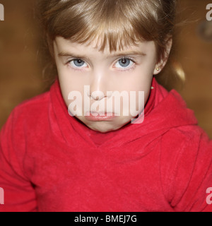 crying weeping gesture face little blond girl face portrait Stock Photo