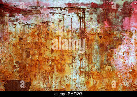 rusty weathered painted iron aged metal texture background Stock Photo